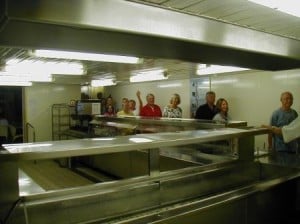 marching in through the crew mess serving area