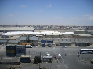 Walvis Bay a town of low buildings with an endless desert at the horiozn