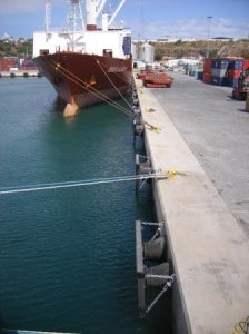 The "Boxy Lady docked behind us, loading and discharging boxes.