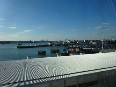 The cruise ships along the long dock further into the port. The tender Calshot can just be seen in the foreground.