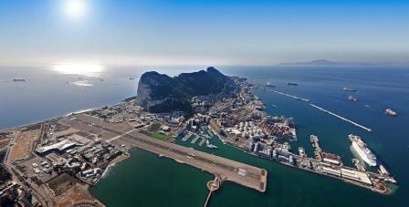Gibraltar from the air. the cruise ship dock is at the far right, where the white (cruise) ship is docked. (Photo courtesy Gibraltar Port authority)