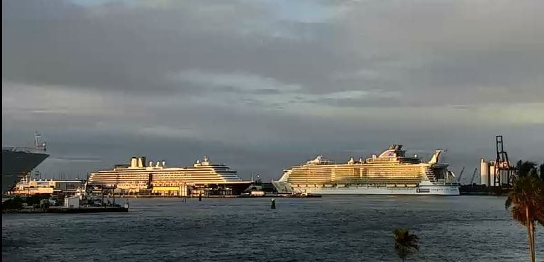 The Westerdam docked. In the back ground the Largest "apartment of the seas" the Allure of the Seas. (Web-shots taken by Lesley Schoonderbeek)
