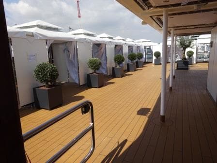 The Retreat behind the Crowsnest. All Cabanas are lined up in an U shape around the outside deck railing.
