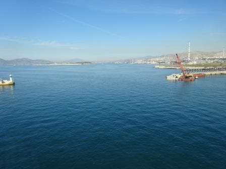 This is the port entrance which is quite tight for a larger ship. One ship found it "too tight" and made the entrance a bit wider. Hence the repair crane being in the process to put the little light house back.
