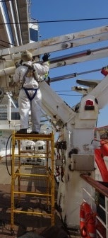 Another safe working item. Working on the Davit. Is the scaffolding safe, wearing safety harnass........ and on a sunny day like this is the sailor wearing safety/sun glasses