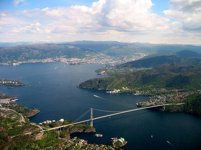Bergen is nestled nicely in a protective valley but rain clouds get caugth in the Horse shoeshape. (Courtesy of Favi Images on Flickr)