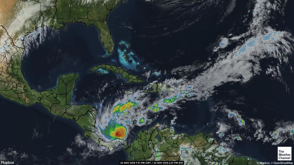 Otto now looks like a tropical storm although still a small one. Thus not much of an deep eye and a swirling -isolated-cloud around it.