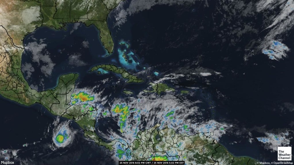 Caribbean weather. white bands over Cuba indicating rain systems coming over and a lot of rain in the aftermath of Otto in the south Caribbean.
