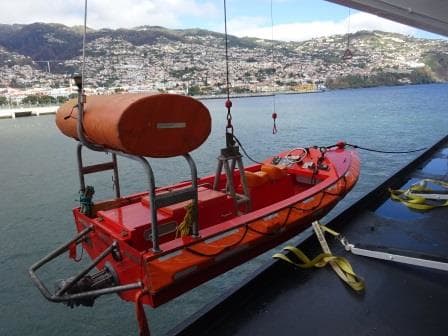 The ps Fast Rescue boat of the ms Oosterdam. The orange drum on the top is a sort spoiler, meant to keep the stern down for better water flow.